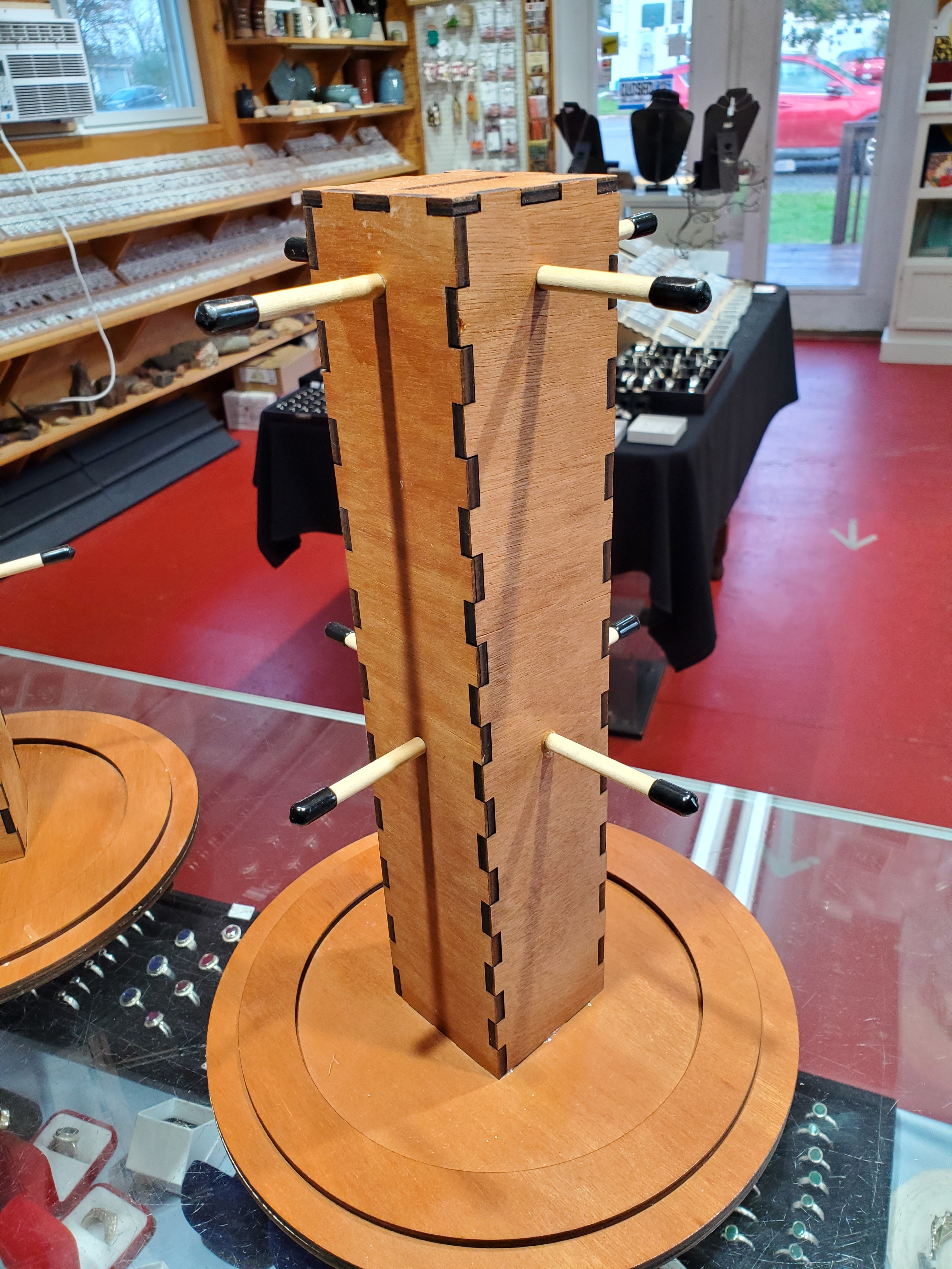 8 peg rotating display case